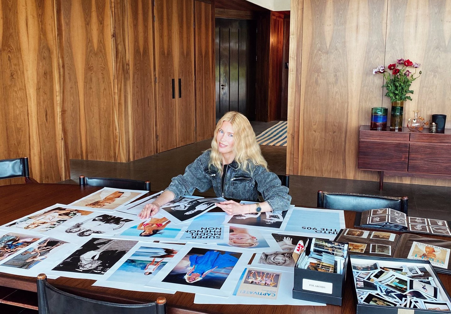 Claudia Schiffer working on the book. Image © Cloudy Film Limited 2021