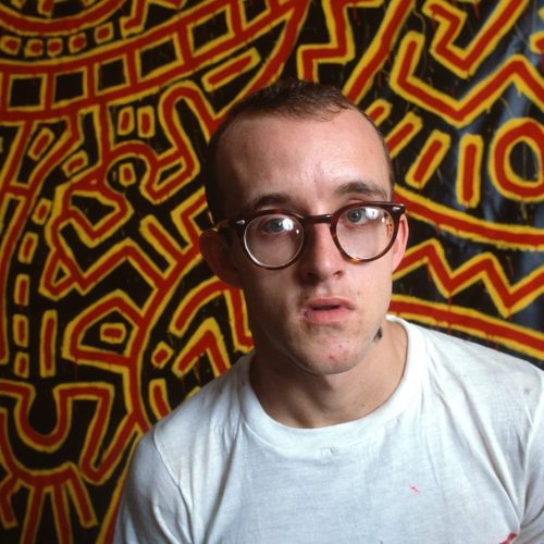 Artist Keith Haring at work in his studio making paintings for an upcoming art exhibit.